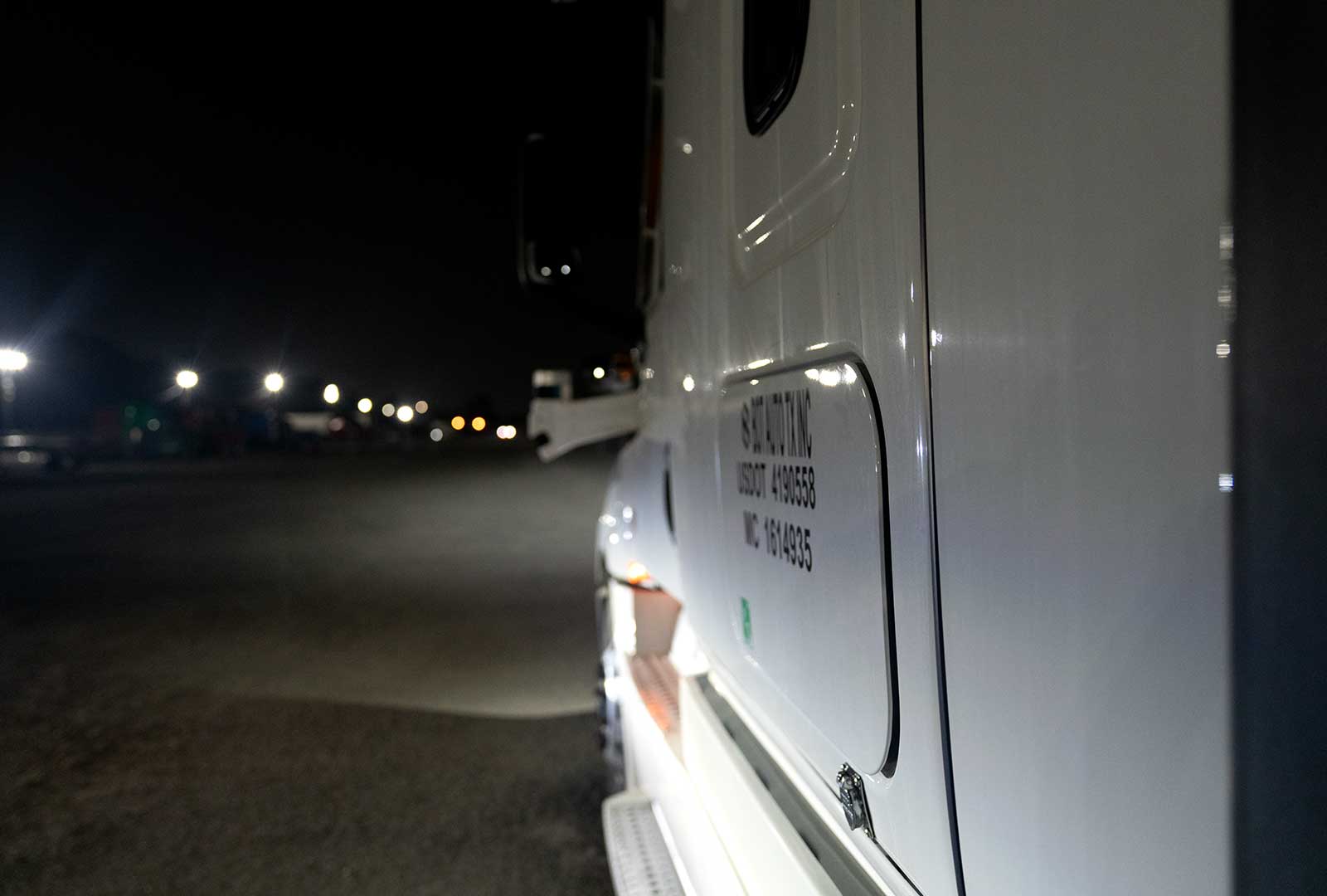 Autonomous delivery truck at night during field testing for commercial launch.