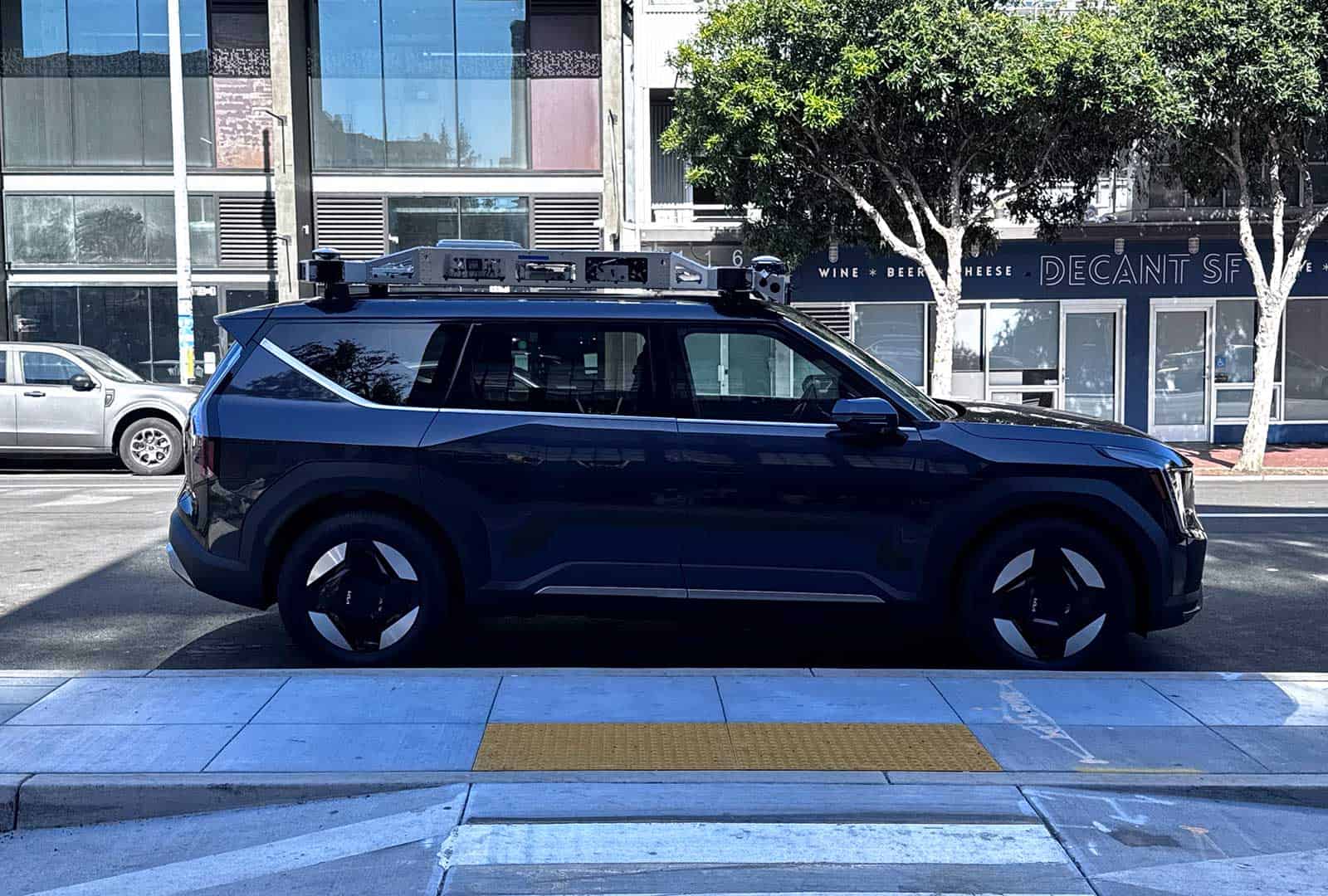 Self-driving car equipped with sensors and cameras for autonomous testing.